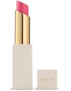 Aerin Tinted Lip Balm balsam de buze tonifiant culoare Petal Pink 2.8 g