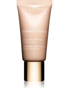 Clarins Instant Concealer corector iluminator impotriva pungilor de sub ochi culoare 02.5 15 ml