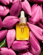 Clarins Lotus Treatment Oil ulei de regenerare cu efect de netezire ziua și noaptea 30 ml