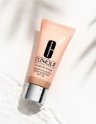 Clinique Moisture Surge™ Sheertint Hydrator SPF 25 cremă hidratantă nuanțatoare SPF 25 culoare Universal Medium 40 ml