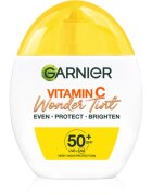 Garnier Vitamin C Wonder Tint Fluid nuantator cu textura usoara SPF 50+ culoare Muedium 40 ml