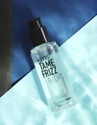 KMS Tame Frizz De-Frizz Oil ulei protector împotriva încrețirii părului pentru păr creț 100 ml