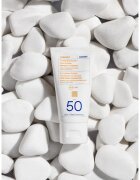 Korres Yoghurt Tinted Sunscreen lotiune de plaja tonifianta SPF 50 50 ml