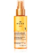 Nuxe Sun Moisturizing Protective Milky Oil For Hair ulei protector pentru parul deteriorat de efectele solare clor si sare 100 ml