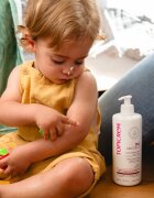 Topicrem AD Emollient Balm balsam loțiune de corp îngrijire pentru piele foarte sensibila sau cu dermatita atopica 200 ml