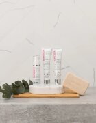 Topicrem MELA Unifying Exfoliating Bar sapun pentru curatare cu efect de exfoliere pentru față și corp 150 g