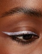 Urban Decay Moondust Liquid Glitter Eyeliner tus de ochi cu particule stralucitoare culoare Pyro 7.5 ml