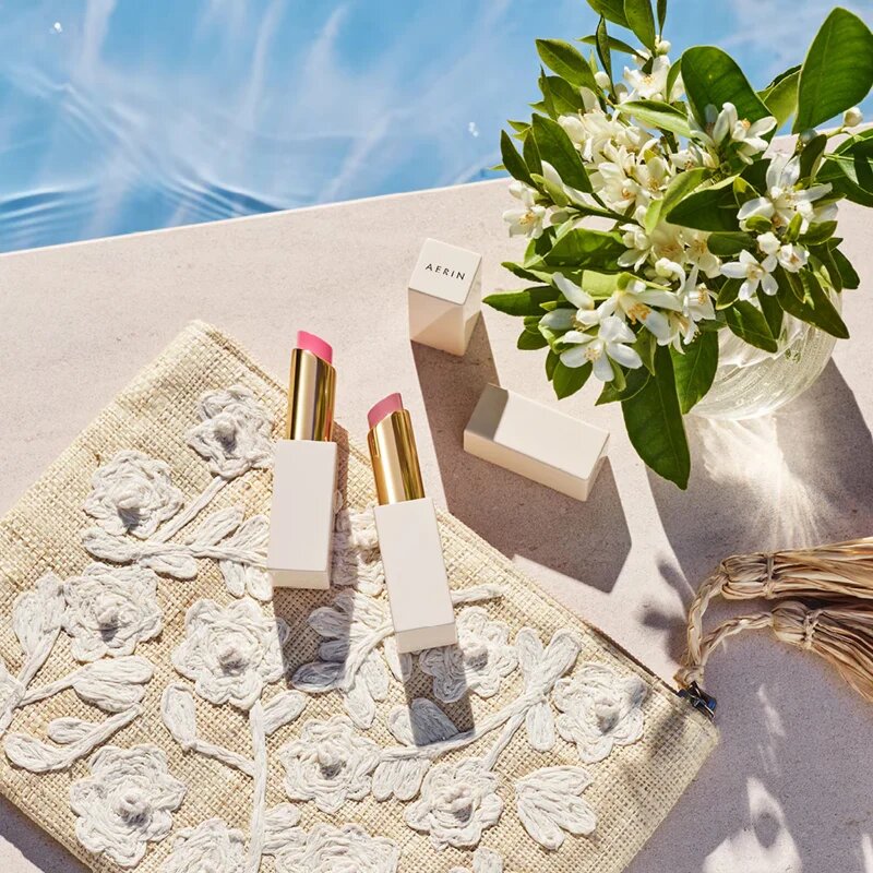 Aerin Tinted Lip Balm balsam de buze tonifiant culoare Petal Pink 2.8 g