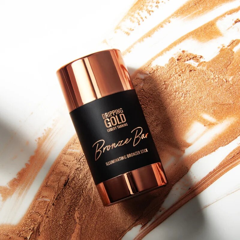 Dripping Gold Luxury Tanning Illuminating Stick Bronzer iluminant pentru fata si corp culoare Bronze 36 g