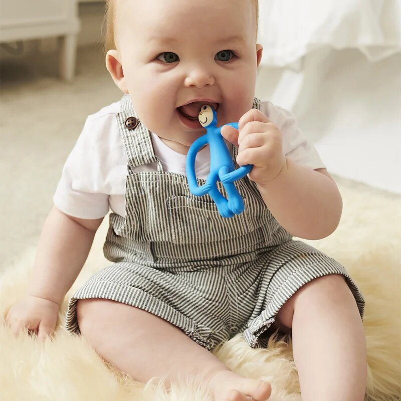 Matchstick Monkey Monkey Teether jucărie pentru dentiție perie 2 in 1 Blue 1 buc